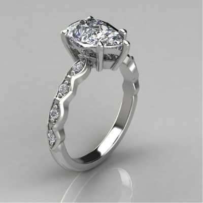 "Curvy Shank Pear Cut Moissanite Engagement Ring " Profile Picture